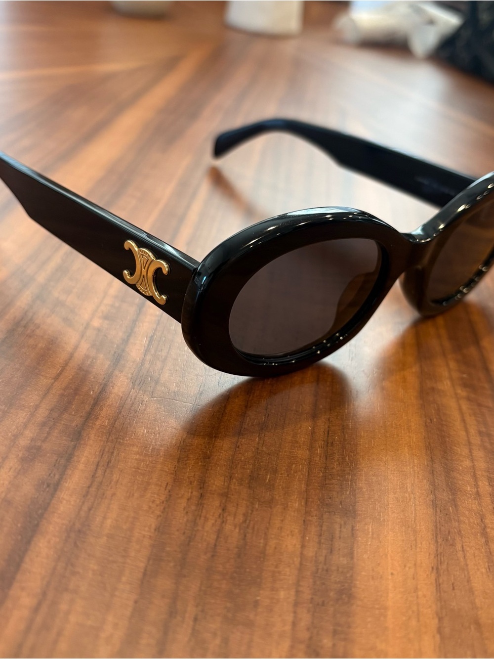 Celine Black Oval Sunglasses with Gold Logo Accent